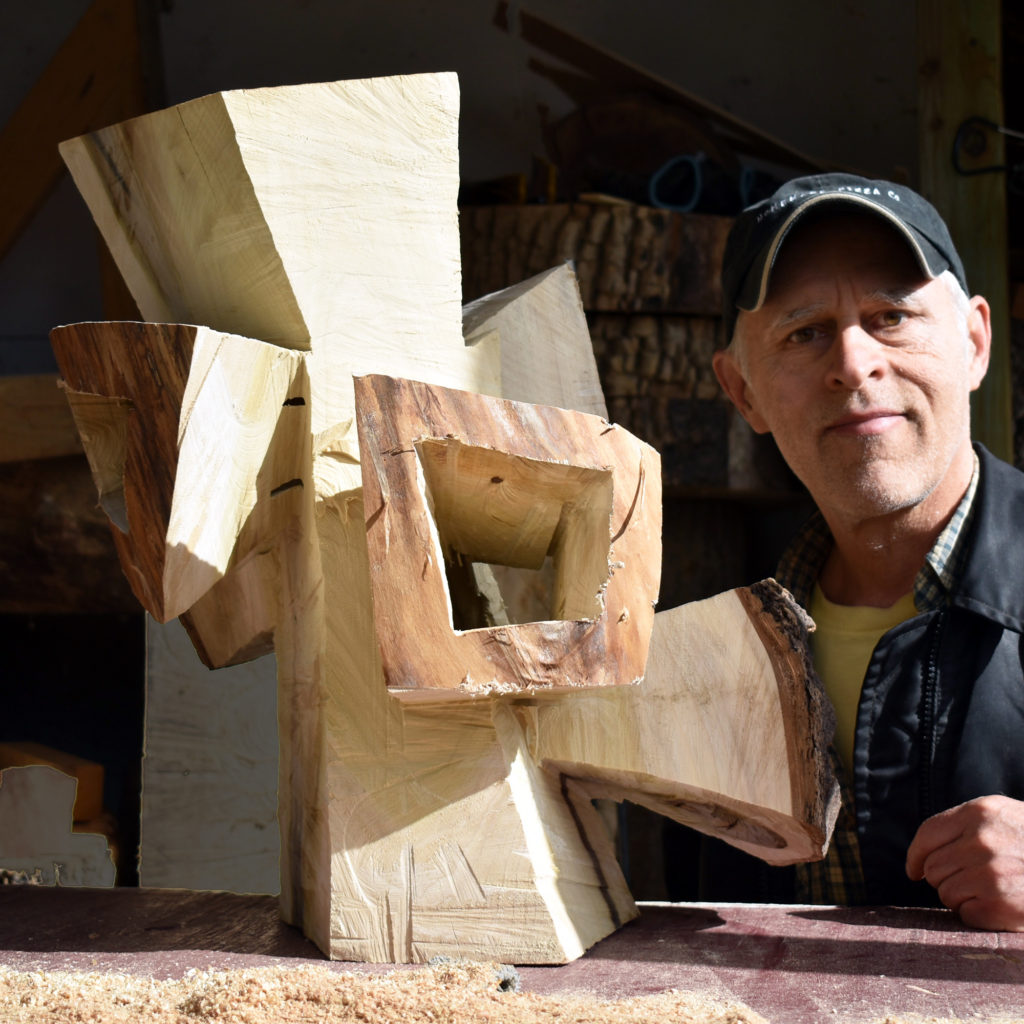 Me beside a roughed out sculpture
